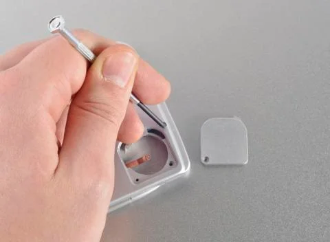 Replacing the battery in the device Stock Photos