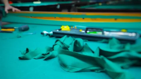 Replacing the Billiard Table Cloth. Repair of Billiard Tables. Stock Footage 124655648