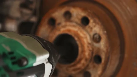 Replacing the brake pads close-up. Car wheel prepared for removing old Stock Footage 159053908