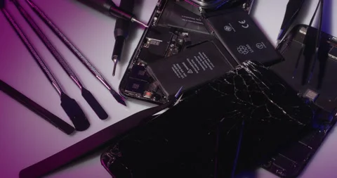 Replacing broken Smartphone battery, tools for iPhone repair Stock Footage 237389345