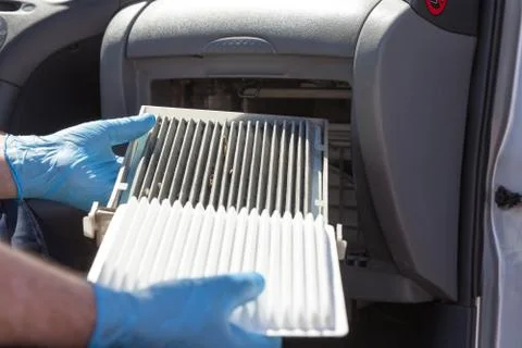 Replacing the cabin air filter Stock Photos