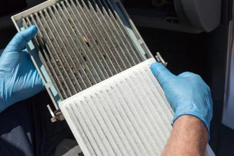 Replacing the cabin air filter Stock Photos
