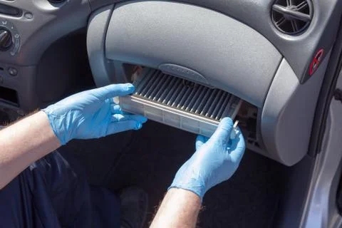 Replacing the cabin air filter Stock Photos