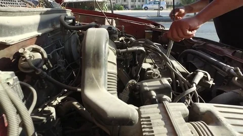 Replacing the candles in the car. Stock Footage 78990713