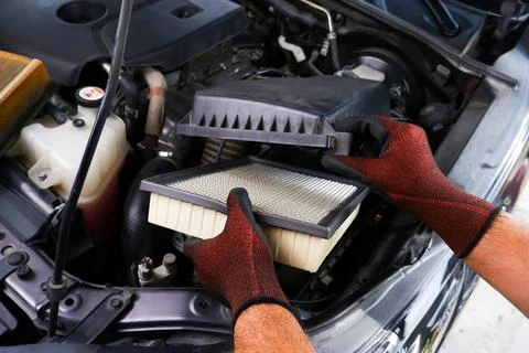Replacing Car Engine Air Filter Stock Photos