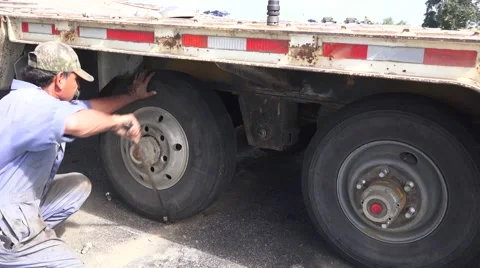 ,replacing flat tire,Big Rig tire change, Stock Footage 50482755