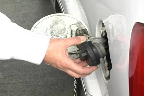 Replacing the Gas Cap on a Vehicle 動画素材 592800