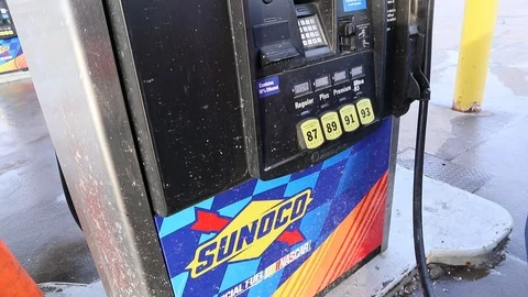 Replacing Gas Pump at U.S. Gas Station after Pumping Gas 動画素材 126945522