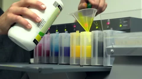 Replacing ink in an industrial digital printer Stock Footage 11882045