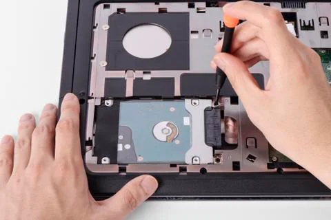 Replacing a laptop hard disk drive Foto stock