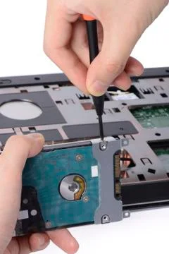 Replacing a laptop hard disk drive Stock Photos