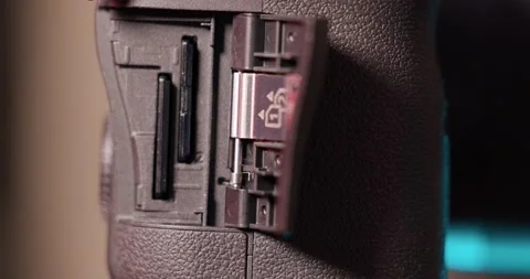 Replacing memory card from camera Stock Footage 149712405