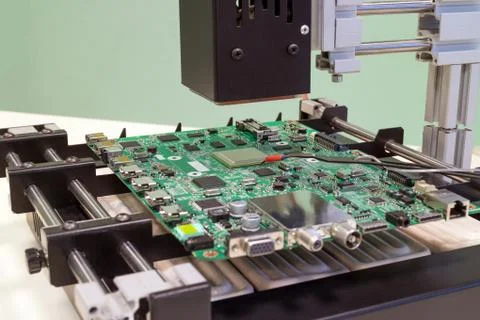 Replacing the microprocessor in bga rework station. Infrared soldering statio Stock Photos