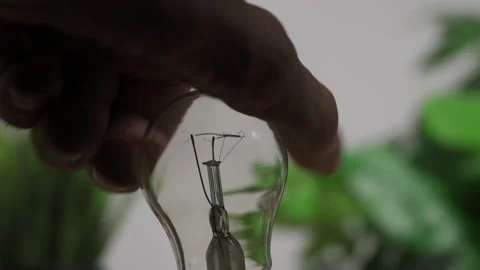 Replacing the old bulb with a new one. Stock Footage 196103650