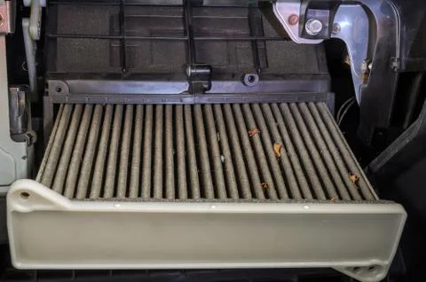 Replacing an old dirty car filter with a new clean one 스톡 사진