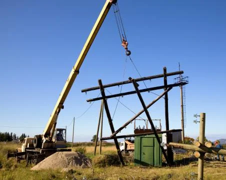 Replacing old power line support Stock Photos