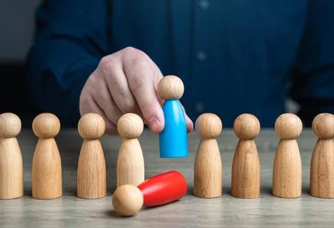 Replacing an old worker with a more loyal or productive one. Installing a sub Stock Photos