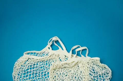 Replacing plastic bags.Taking care of the environment. Empty mesh, awosika on a Photos