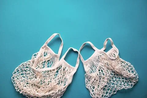 Replacing plastic bags.Taking care of the environment. Empty mesh, awosika on a Stock Photos