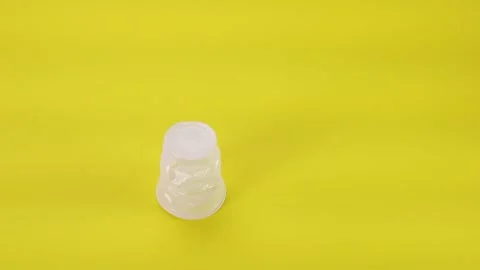 Replacing a plastic cup with an Eco glass Stock Footage 143615448