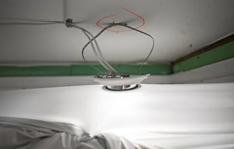 Replacing the stretch ceiling in the bathroom. Stock Photos