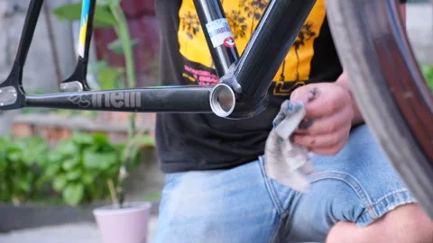 Replacing the system on a track bike Stock Footage 241488681