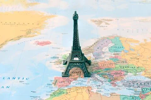 Replica of Eiffe tower on map of Paris in France. Stock Photos