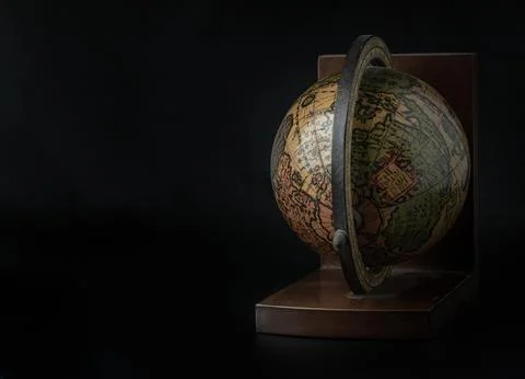Replica Globe or World Globe Map on dark background. Stockfoto's