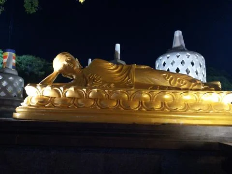 Replica of sleeping buddha Stock Photos