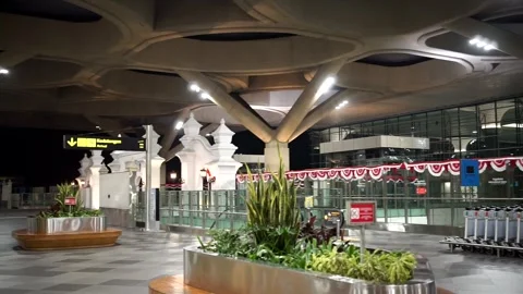 A replica of a traditional Javanese gate inside the terminal 库存影片 343578949