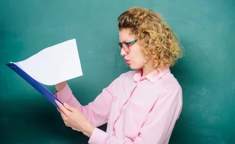 Report project. back to school. essay writing. teacher with document folder Stock Photos