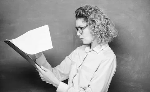 Report project. back to school. essay writing. teacher with document folder Stock Photos