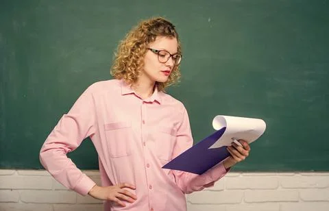 Report project. back to school. essay writing. teacher with document folder Stock Photos