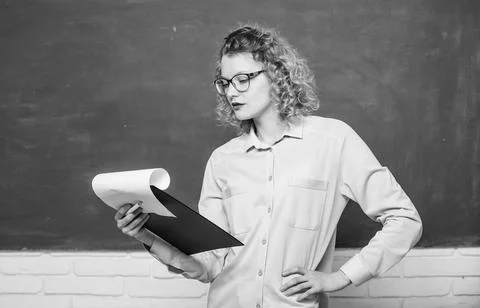 Report project. back to school. essay writing. teacher with document folder Stock Photos