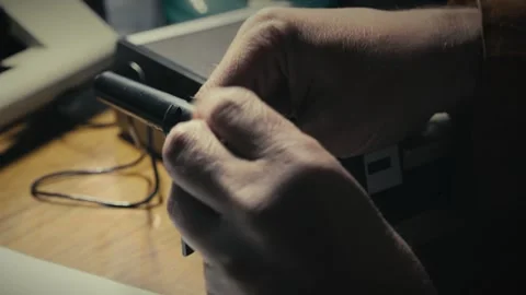 Reporter sets up Desktop microphone for retro analogue tape recording Stock Footage 308788655