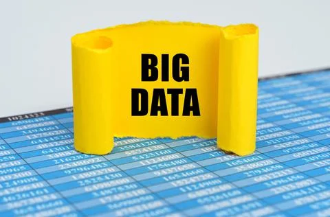 On reporting documents, a yellow paper plate with the inscription - BIG DATA Stock Photos