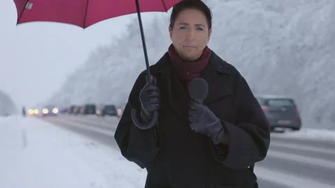 Reporting on Winter Road Conditions Stock-Footage 214045557