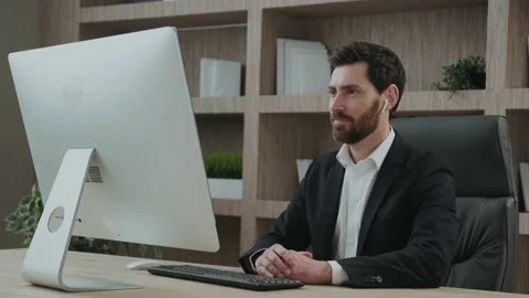 Representive middle aged employee leading an online meeting or discusion, in Video stock 196297767