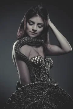 Reptile, brunette woman posing with a python snake australian Stock Photos