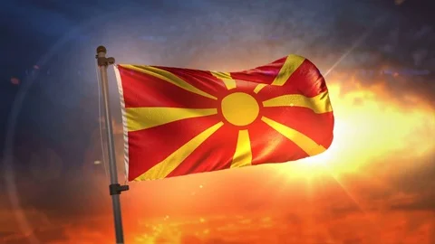 Republic of Macedonia Flag Backlit At Beautiful Sunrise Loop Slow Motion 4K Stock Footage 76577486