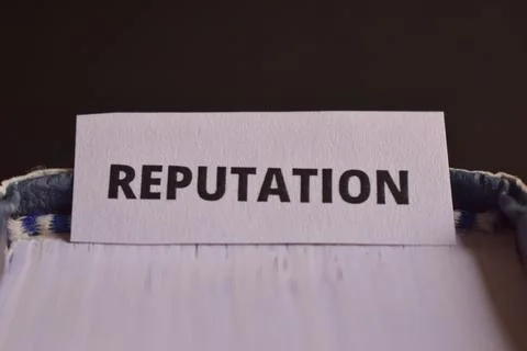 Reputation Concept Bookmark Inserted in Book Representing Trust, Image and .. Stockfoto's
