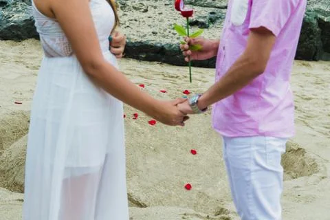 Request for a hand on the beach Stock Photos