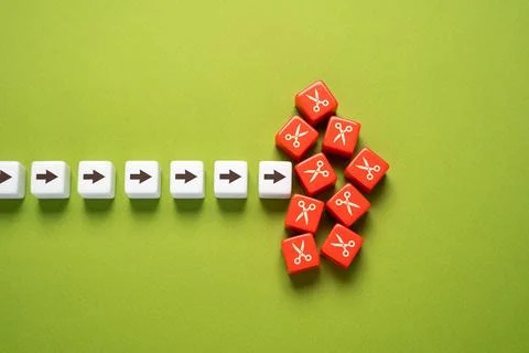 A requirement to cut back on some work, processes, or expenses. Reduce comple Stock Photos
