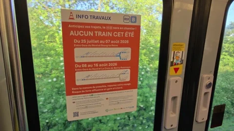 RER B Summer Works Disruption Notice Posted On Train Door Window, Close Up Shot Stock Footage 335377349