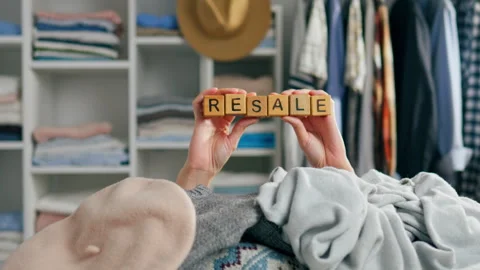 Resale of worn detained items, second hand. A bunch of well-worn worn clothe Stock Footage 243004294