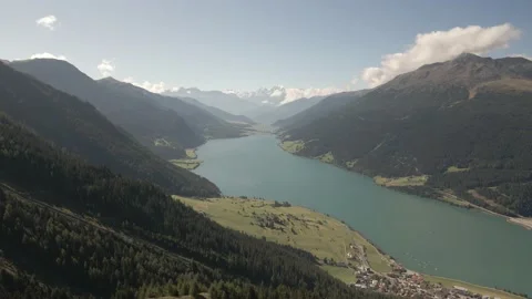 Reschensee, an artificial lake in the western portion of South Tyrol, Italy Stock Footage 140455216