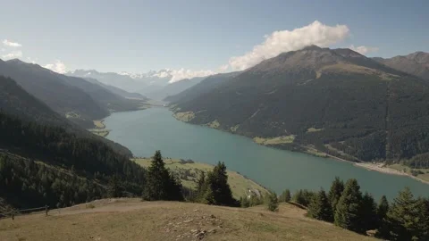 Reschensee, an artificial lake in the western portion of South Tyrol, Italy Stock Footage