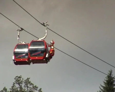 Rescue drill with helicopter by an austrian "cable-railway" Stock Footage 107418