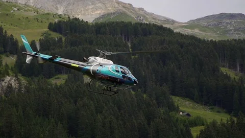 Rescue Helicopter flying in the mountains Stock Footage 87858718