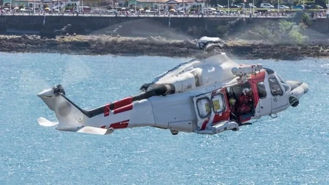 Rescue helicopter flying in slow motion Видео 73672161